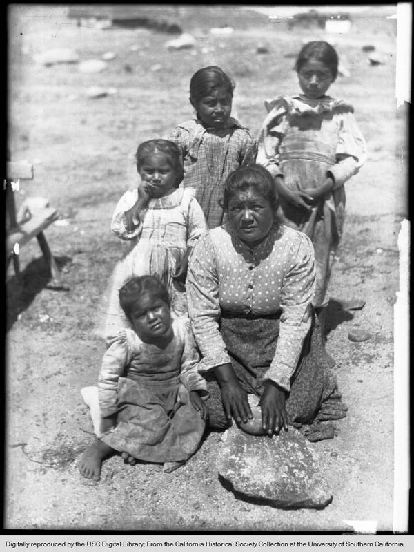 Agua Caliente Indian woman, Nievas Chaves, with a metate stone, 1903 (James, George Wharton)